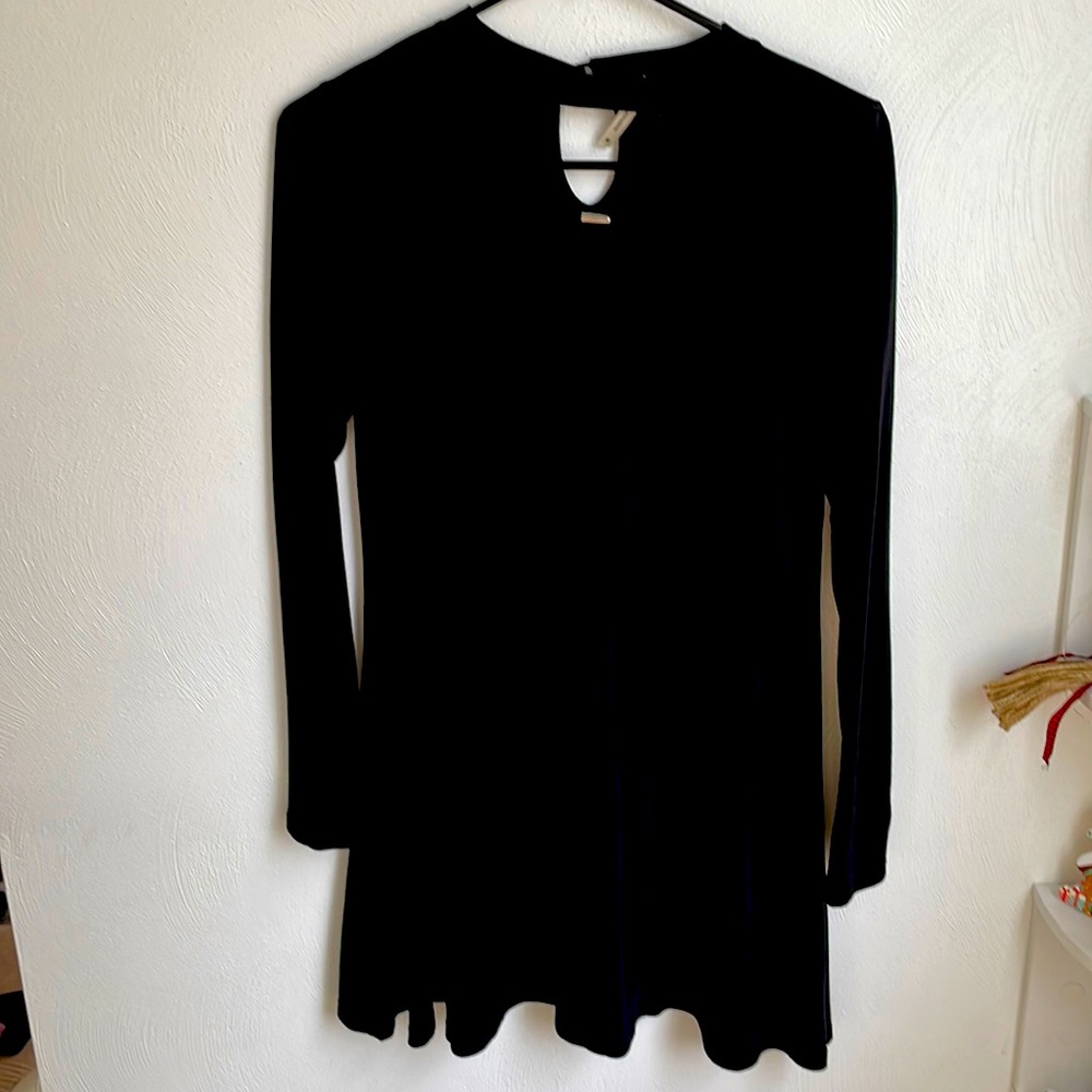 Black long sleeve mini-dress.